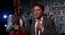 A white time traveller teaches Chuck Berry to play guitar