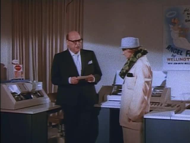 Programming a computer with punch cards in The Fat Spy